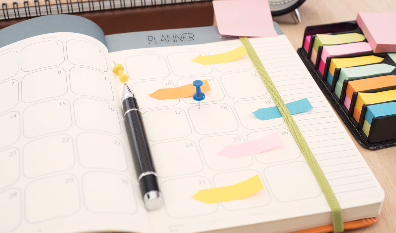 planner with sticky notes