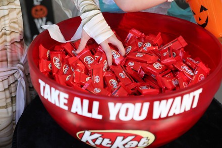 Halloween candy bowl filled with Kit-Kats