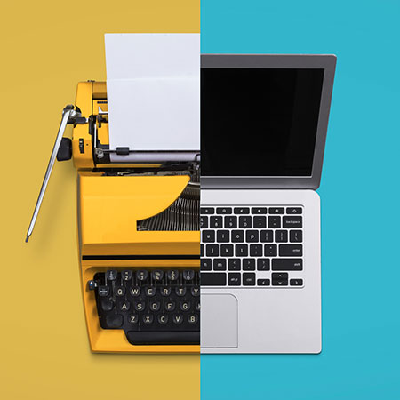 Typewriter and laptop-computer