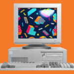 old computer on orange background