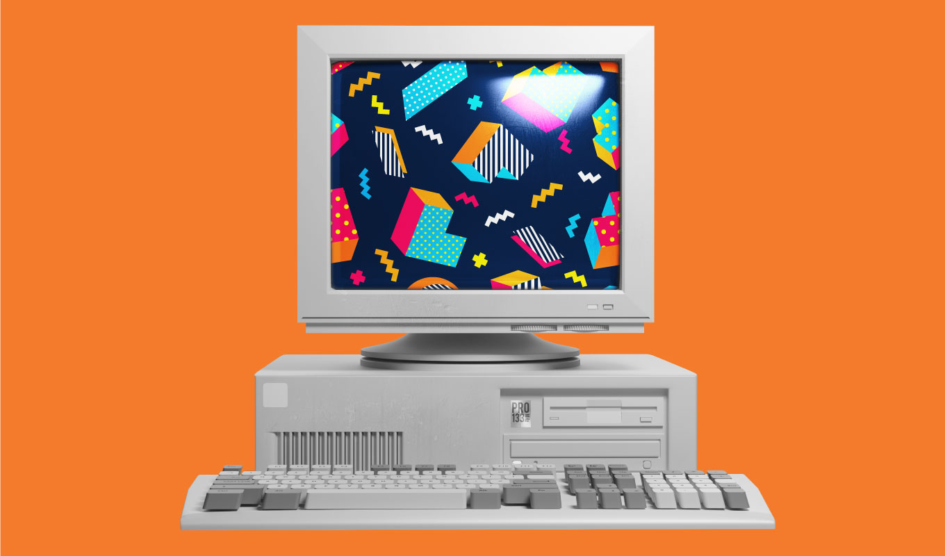 old computer on orange background