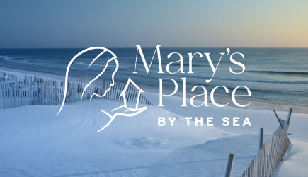 Mary's Place by the Sea logo on a picture of a New Jersey beach